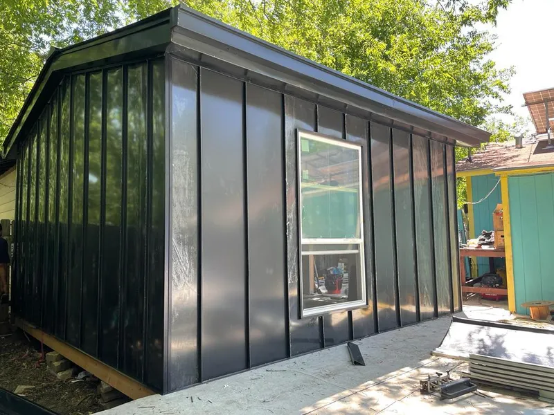 Black standing seam metal wall panels for Roof Inspection in Markham